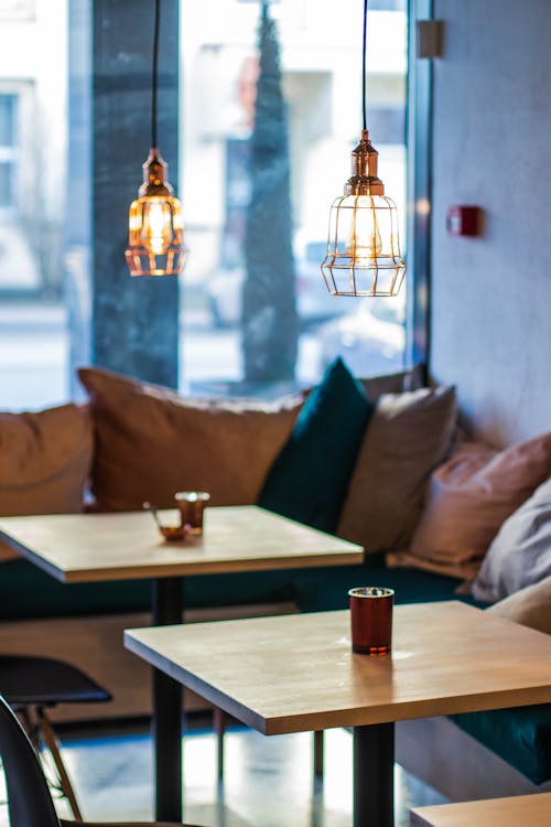 Free Two Round Pendant Lamps in Cafeteria Stock Photo